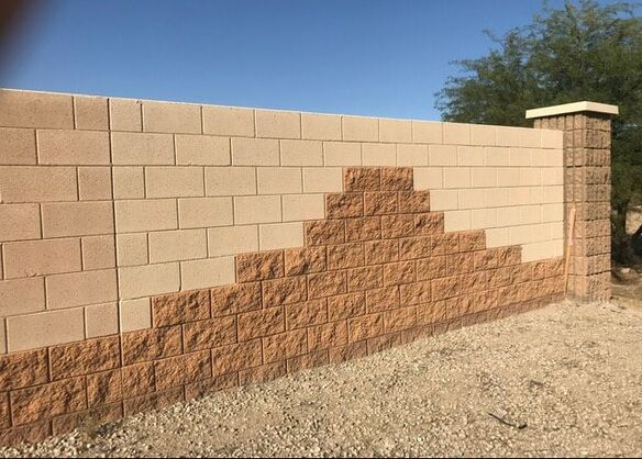 Block wall in Mesa, Arizona decorated with contrast colored blocks